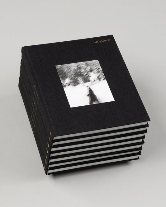 stack of black hardcover books